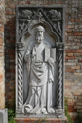 Saint John the Evangelist, high relief end of the 14th century (?), from the facade of the church of the same name in Torcello. Exterior, at the foot of the stairs of the Archives building - Torcello Museum, Venice
